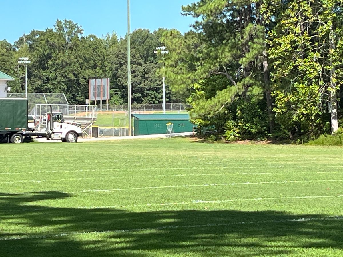 Hole 1 is a diagonal shot across the band practice field. Good hole to measure distance.
