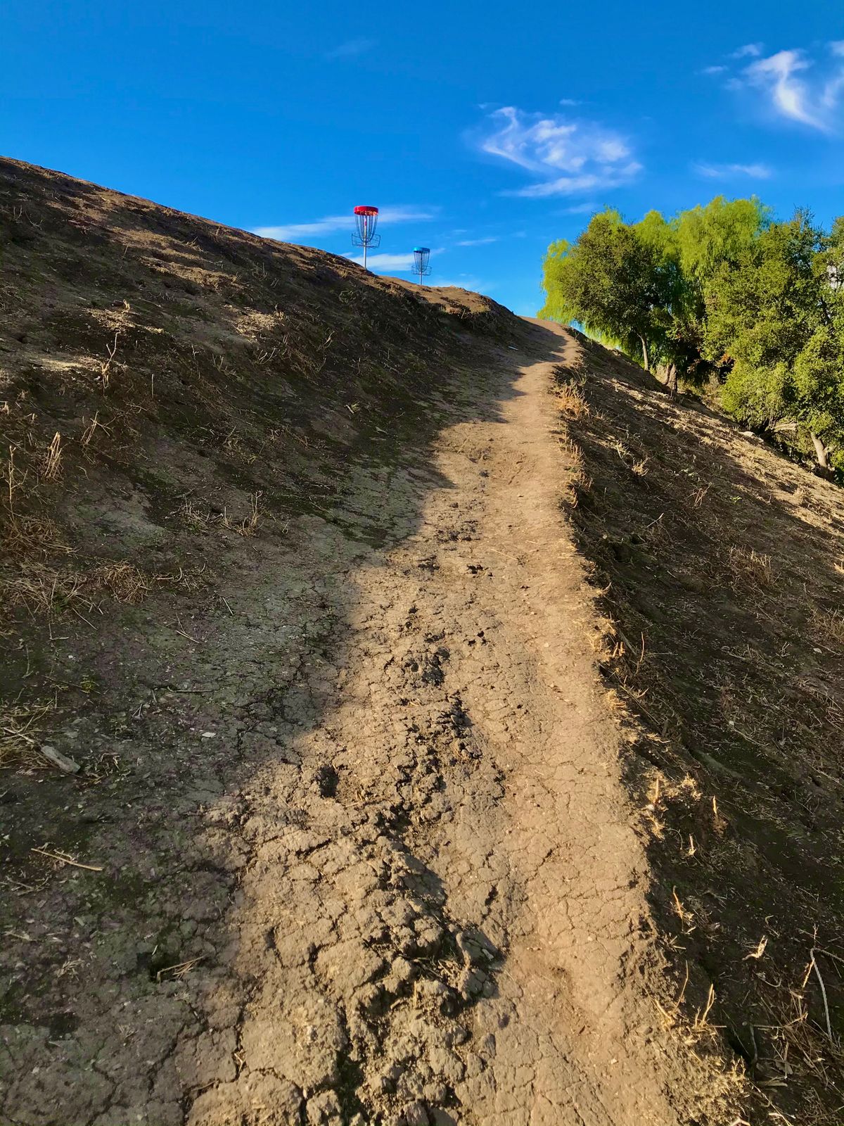 You better be able to throw uphill and not go out of bounds into the creek!