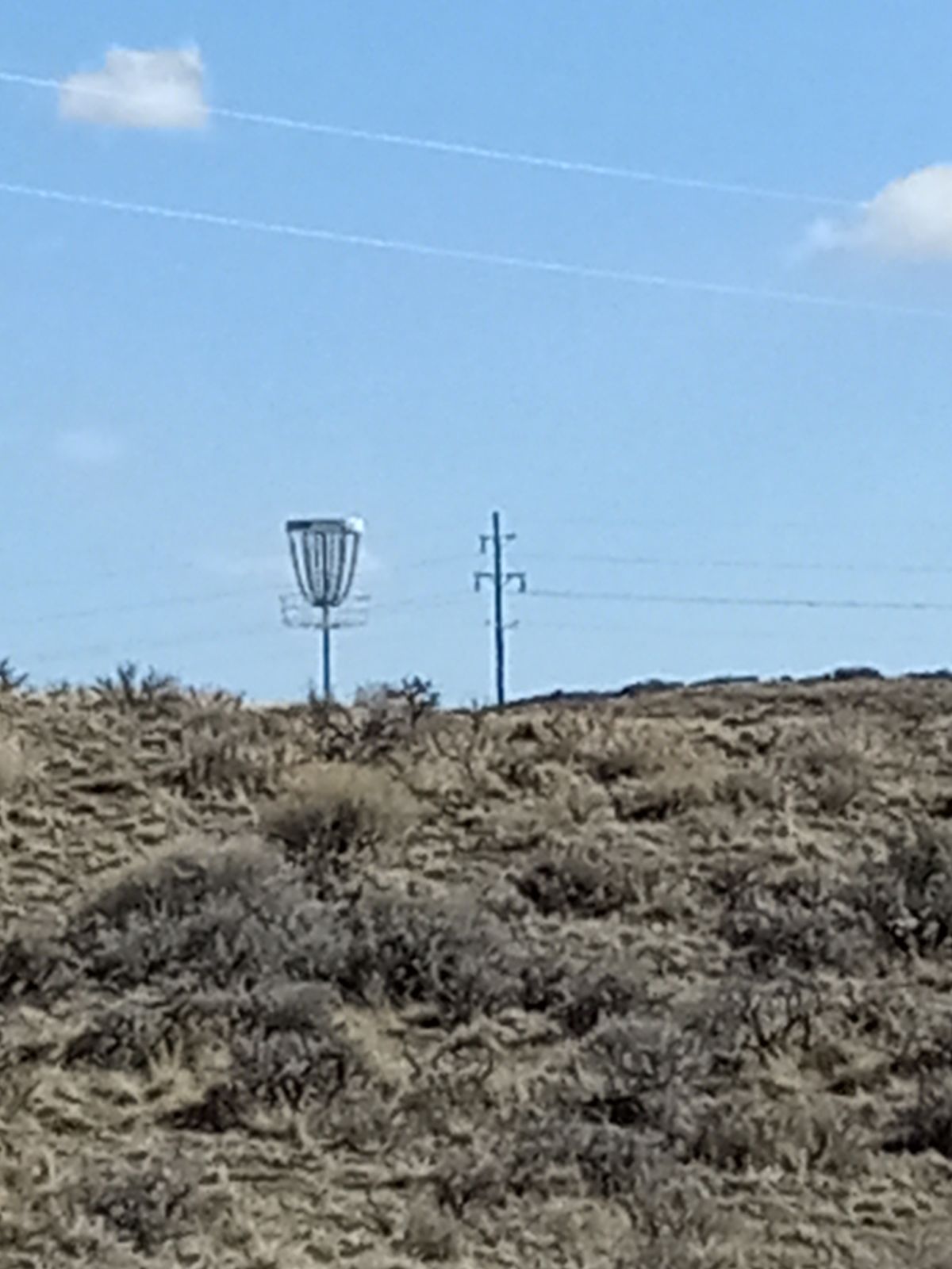 Hole 2: The picture is taken midrange looking up at the basket.