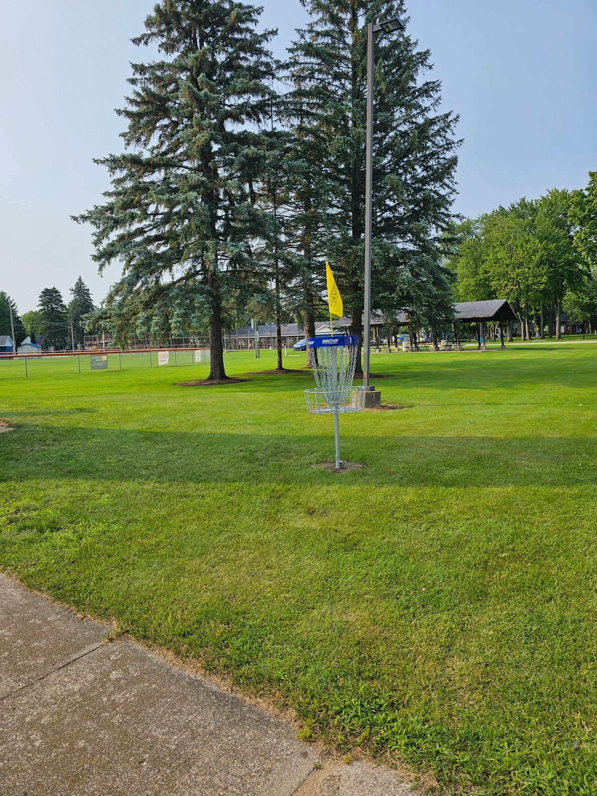 Hole 1 basket to tee, recommend personal mando on left side.