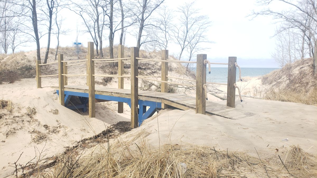 Bridge over sand dunes on hole 9 and 10