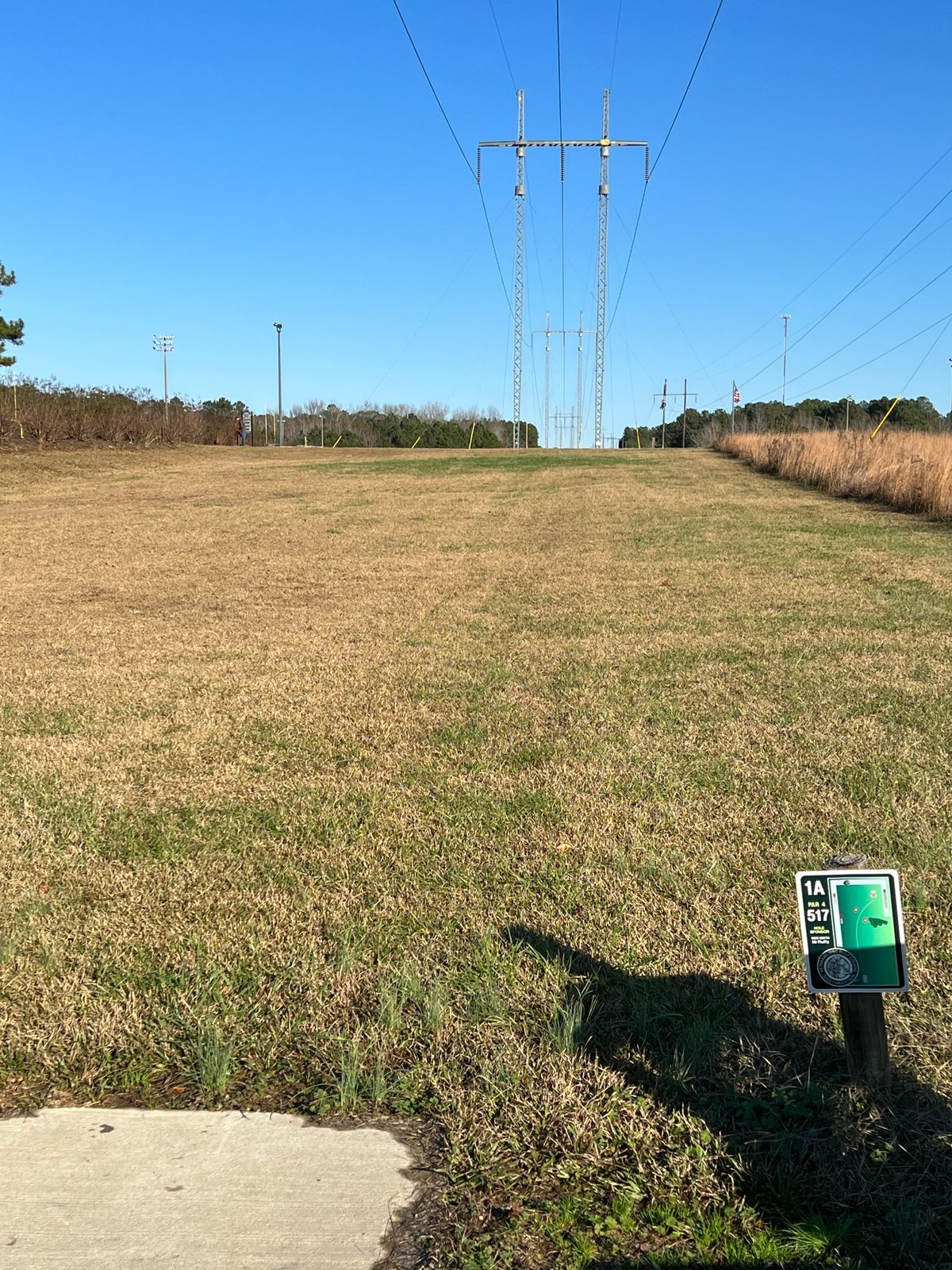 Hole 1A Long Tee