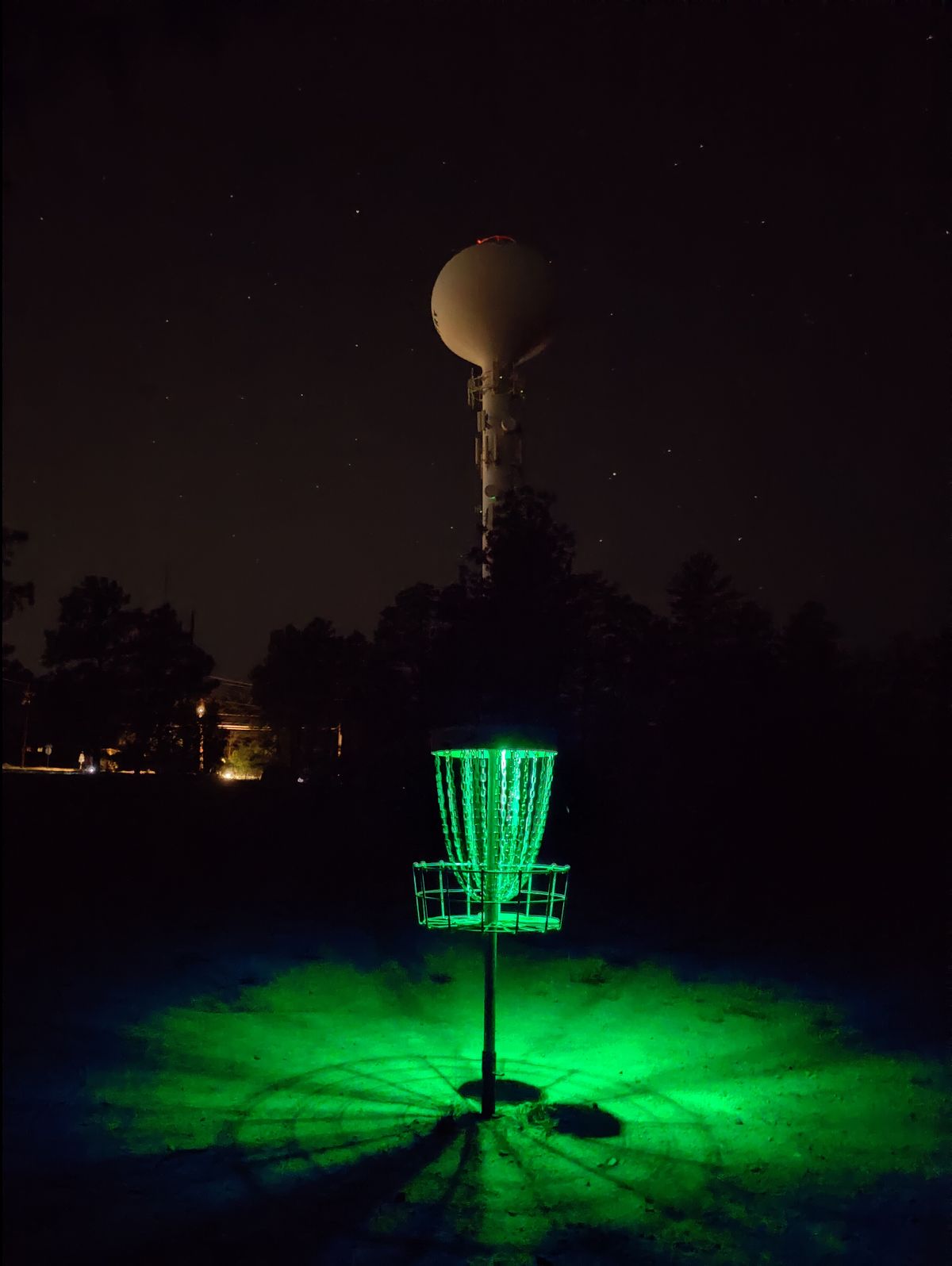 hole five during a glow round at night