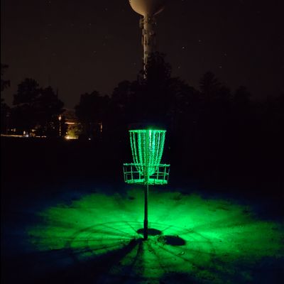 hole five during a glow round at night