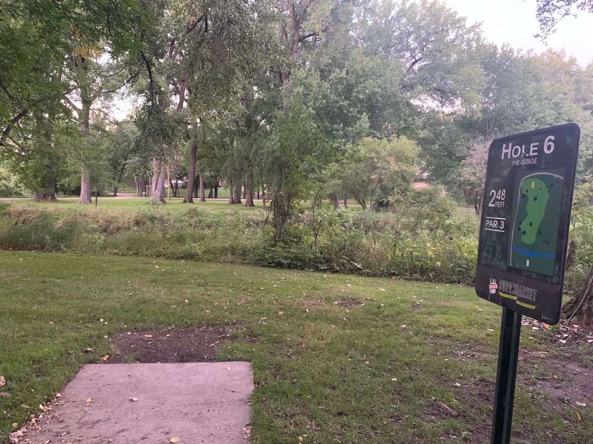Hole 6 tee pad. This shot plays over a very small ravine/creek.