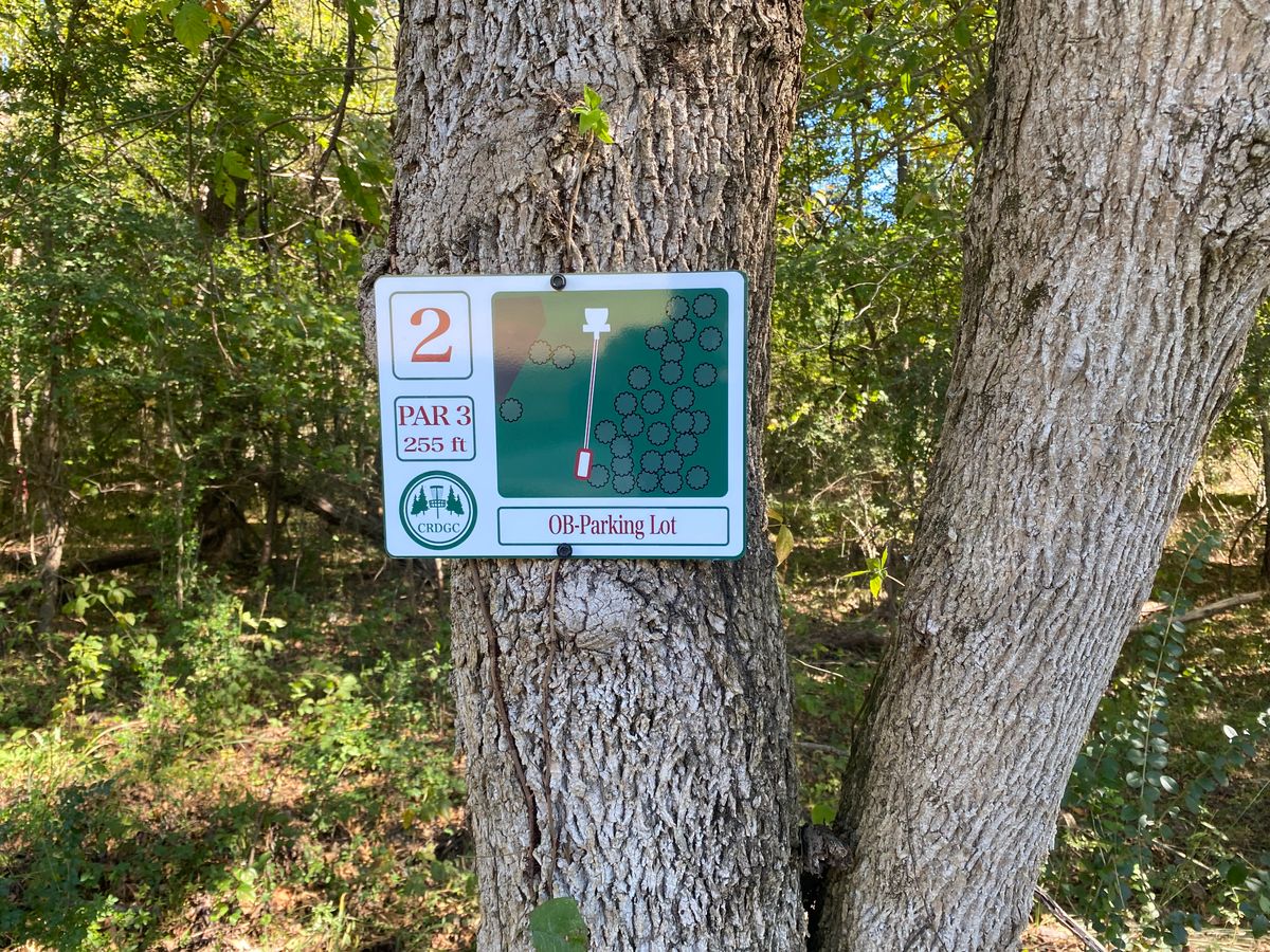 Hole 2 sign (red/white)