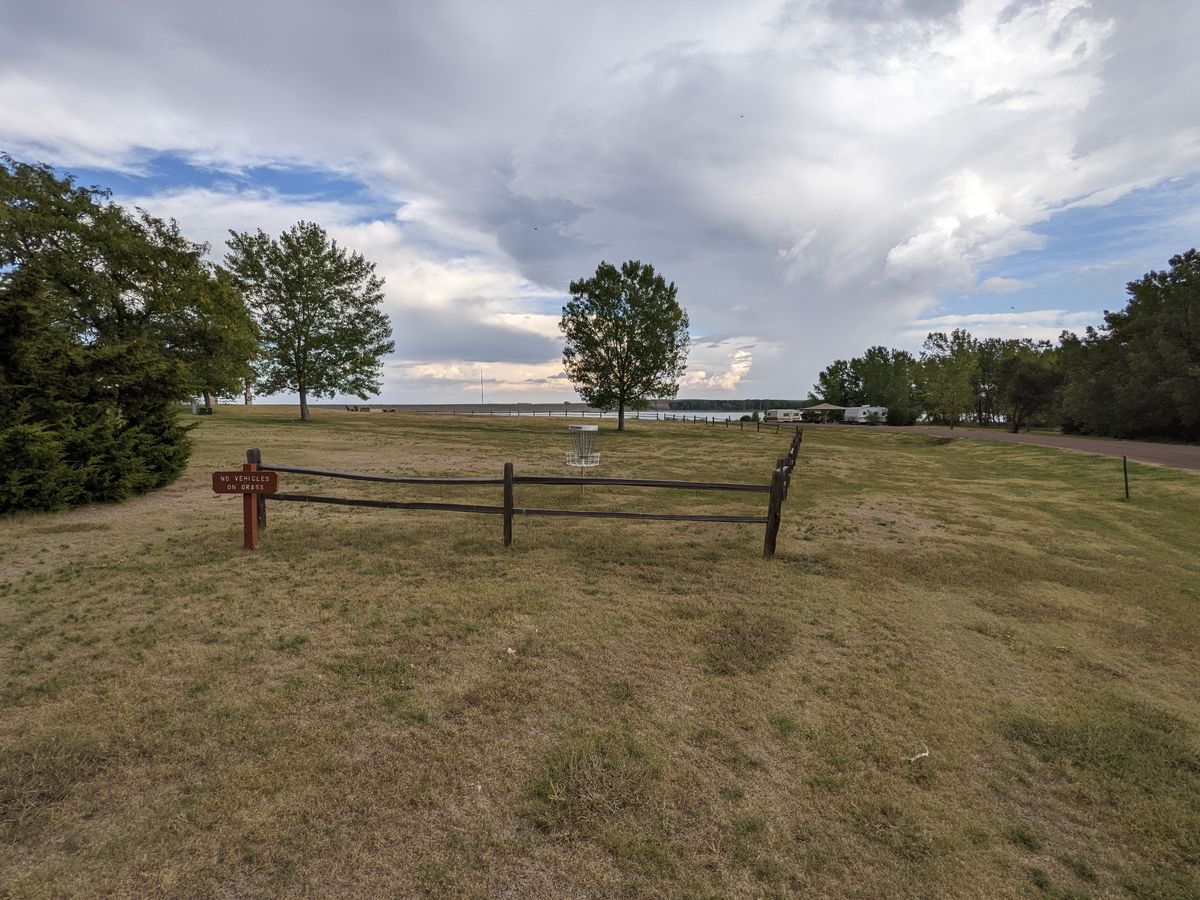 Hole 10 basket (fence is OB line)