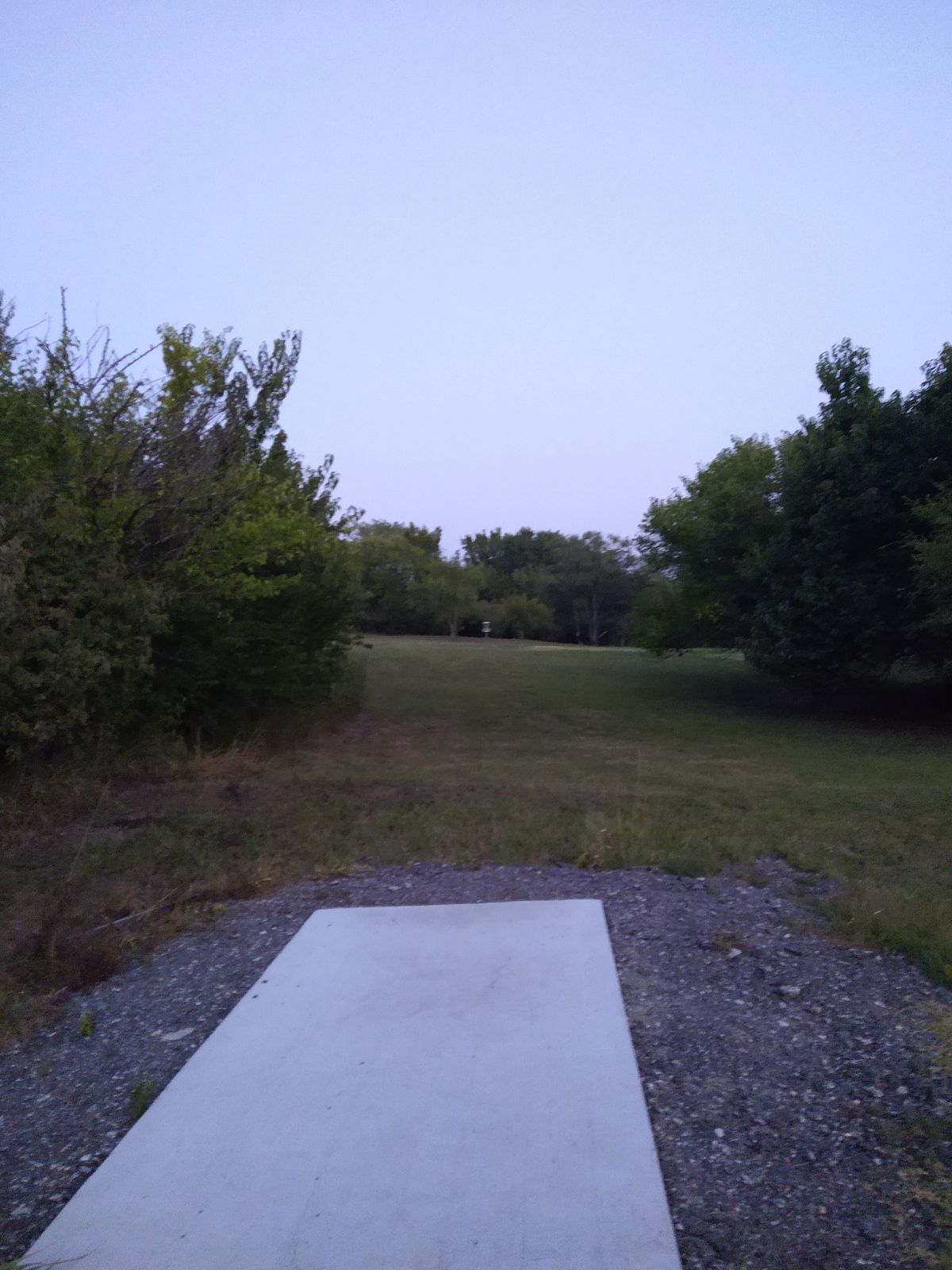 15th Tee to the basket on the mound. If you don't see a basket it may be in alt B position the woods.