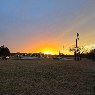 Hole 18 fairway looking right toward playground at sunset
