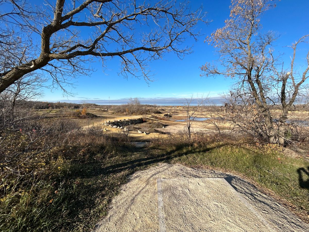 Blue tee box from hole 1 beginning overlooking the quarry.