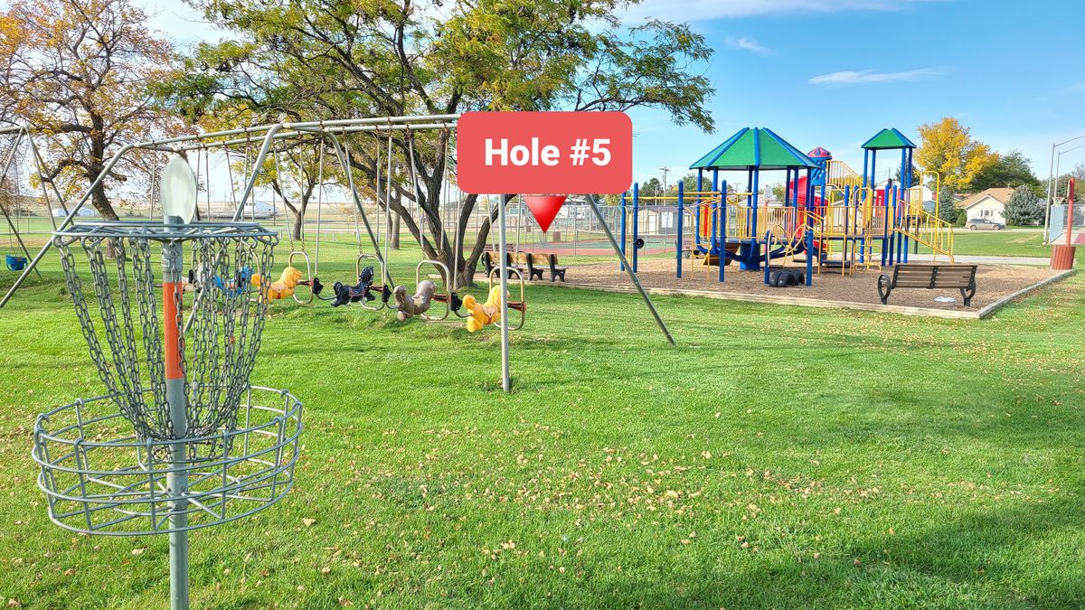 Hole 5, hyzer over playground.
