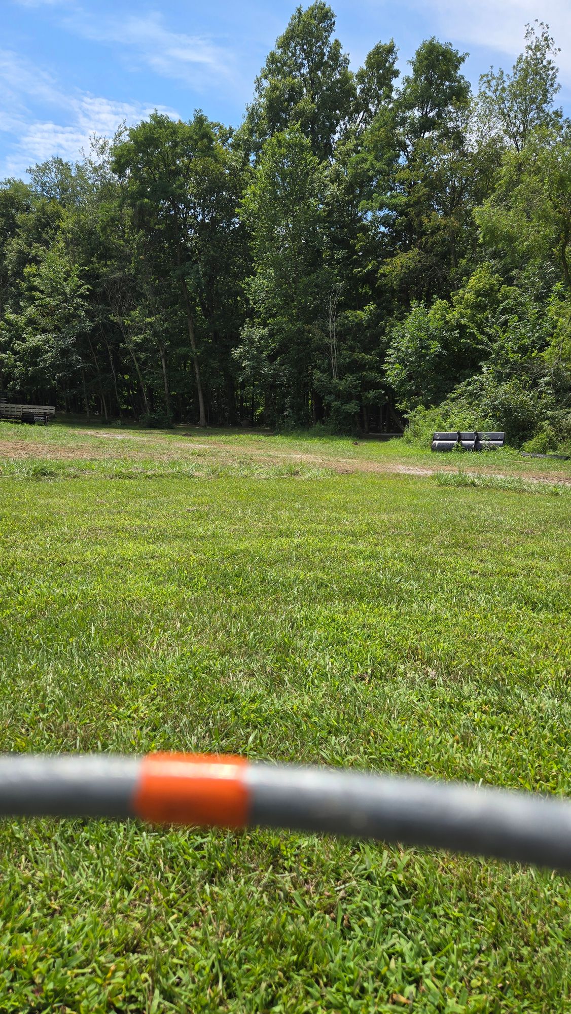 Orange tape denotes direction of travel to next hole.