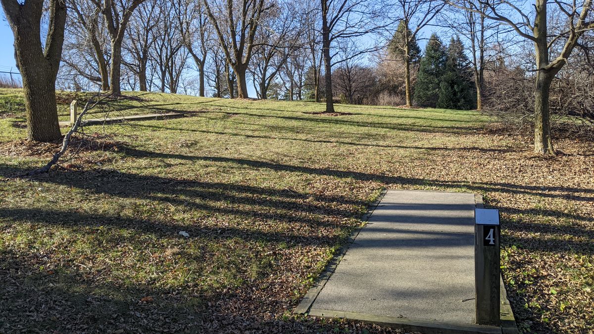 Tee #4. (two tee pads). Basket missing so I used the scar on the big tree