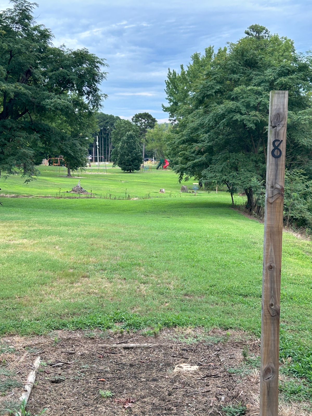Hole 8 down fence line and creek. Throws between the trees across ditch back to the right.