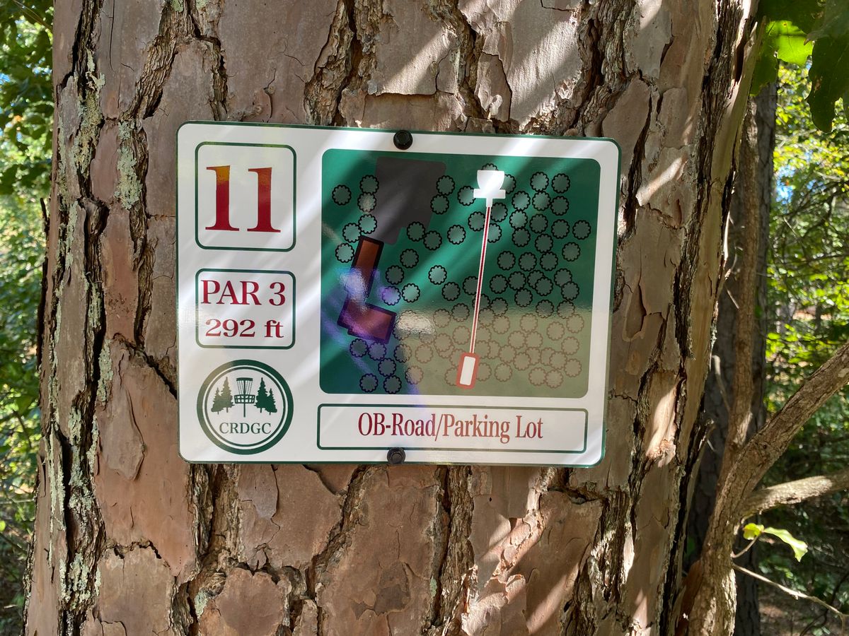 Hole 11 sign (red/white)