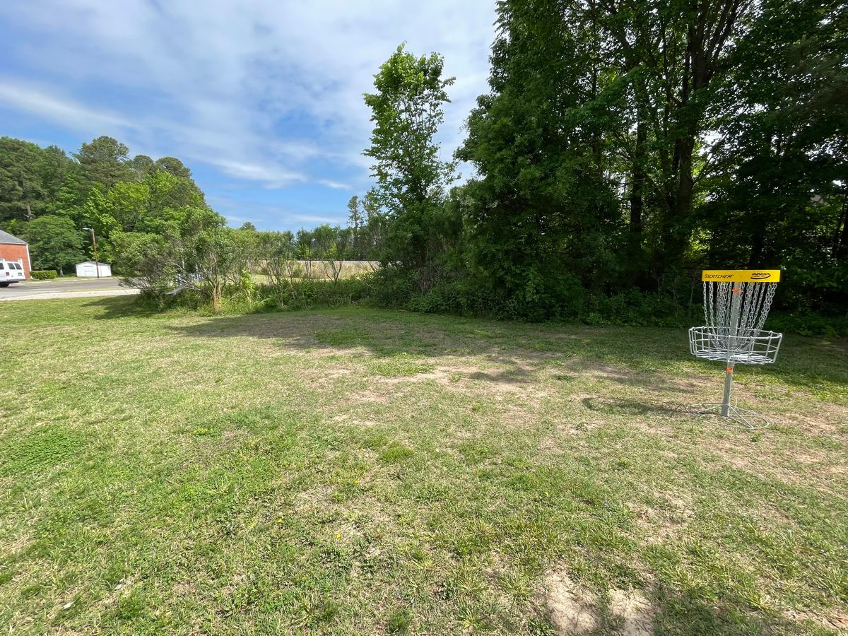 Target 4 is the light pole (marked with orange tape) near the white shed.