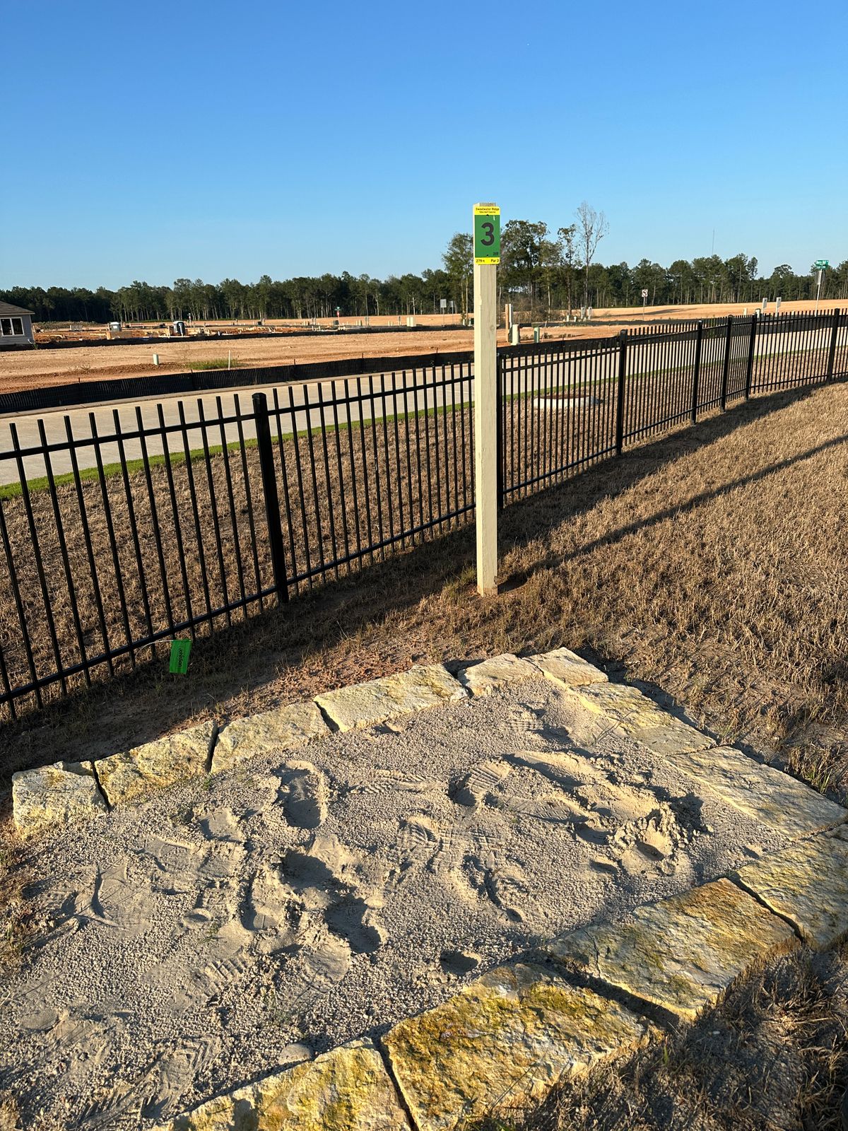 Hole 3 tee sign and tee pad