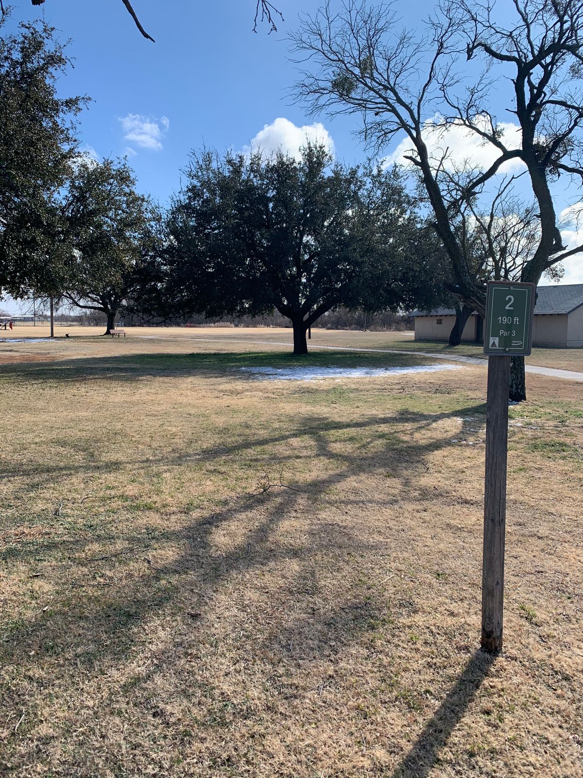 Hole 2 behind the building on the right