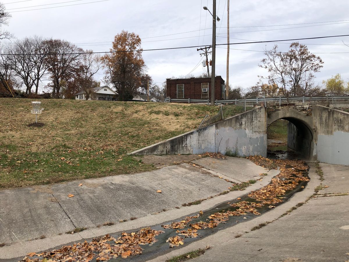 Hole 5 basket with adjacent drainage tunnel