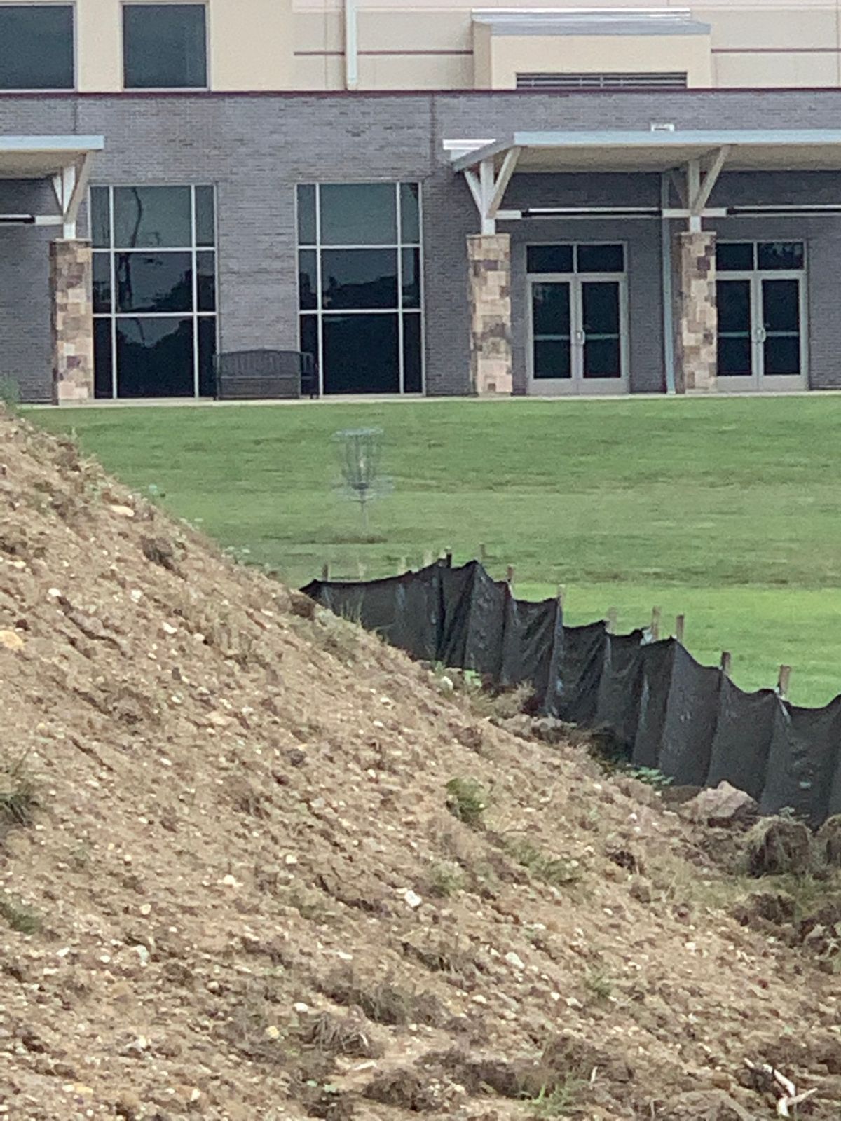 Basket for number 9 from side of tee pad due to dirt pile.