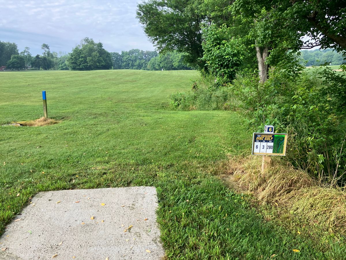 Hole 6 250’ to the right basket along side creek. Creek plays OB.