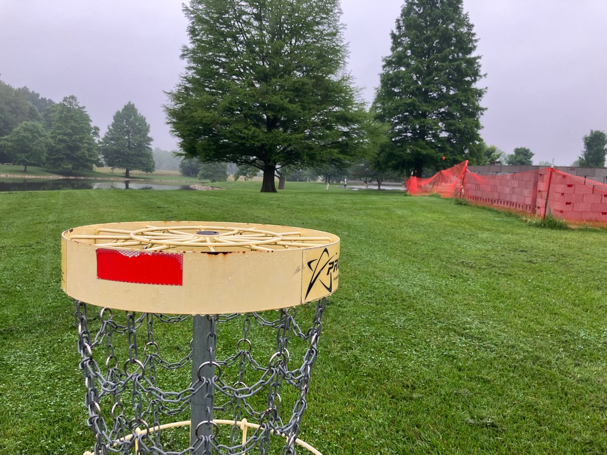 Hole 17 looking from the basket at the tee box. 275ft shot adjacent to the lake which is OB