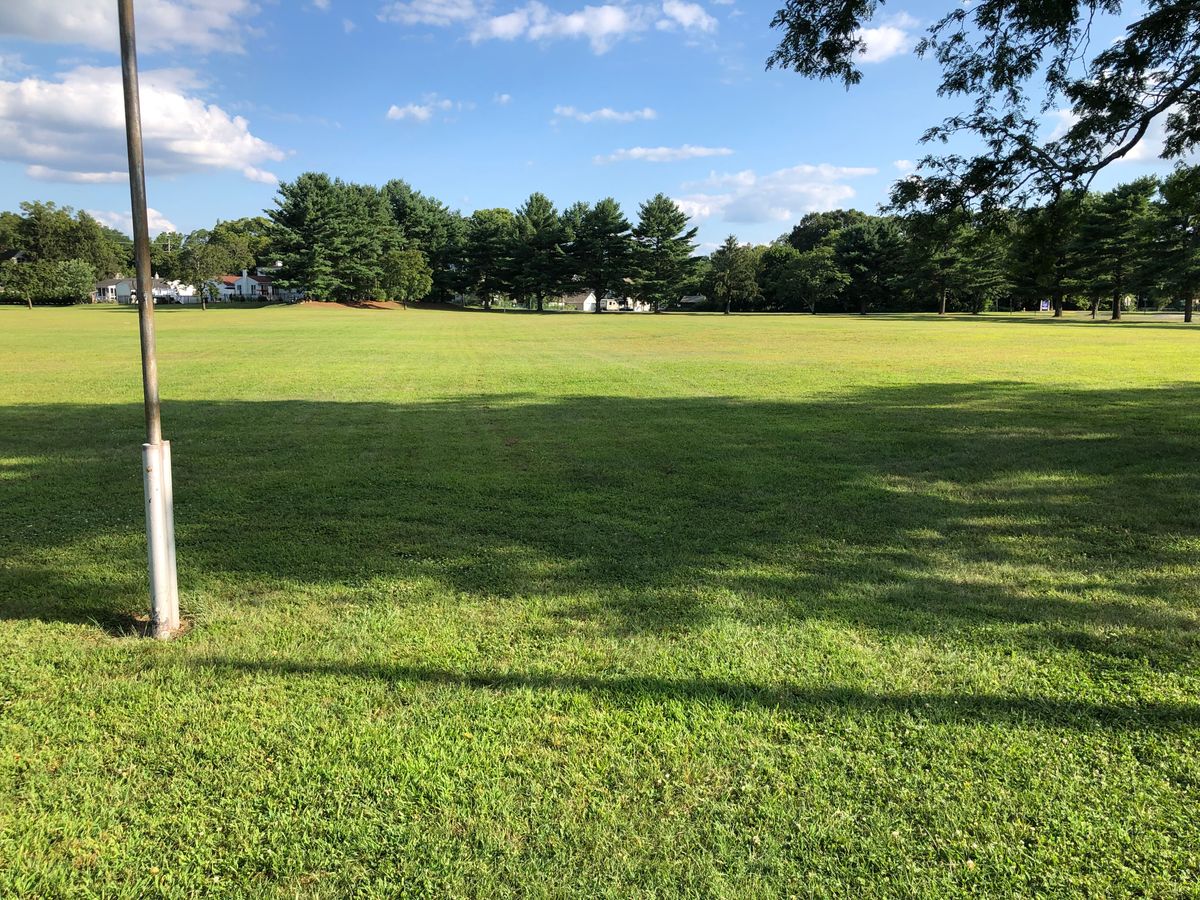 #5 Tee Box - to the right of the mast pole.