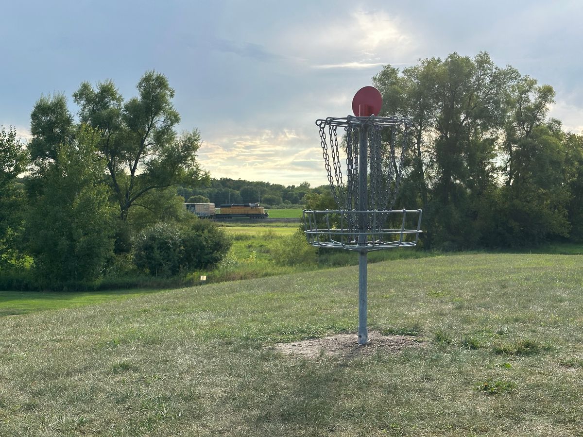 Hole 6 with a passing train