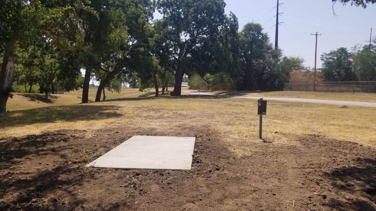 Concrete tee pads are in for all 18!  Hole 2.