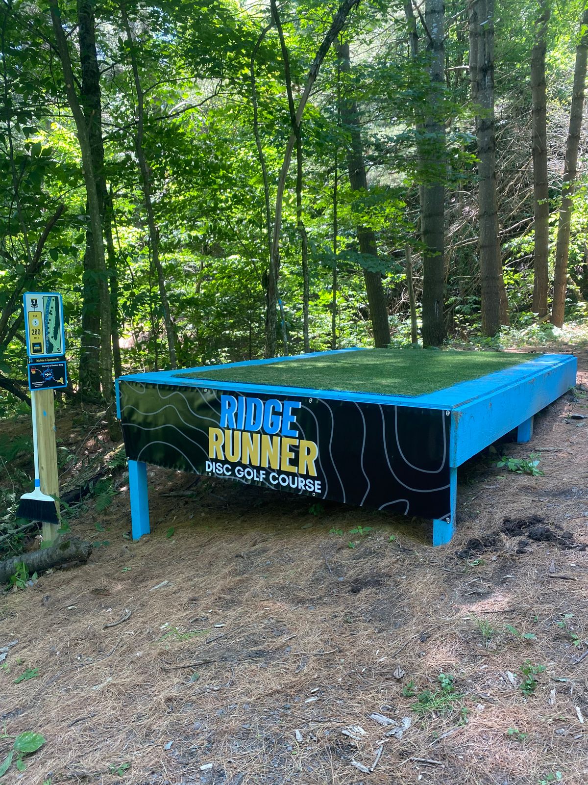 Hole 2 tee deck with new banner