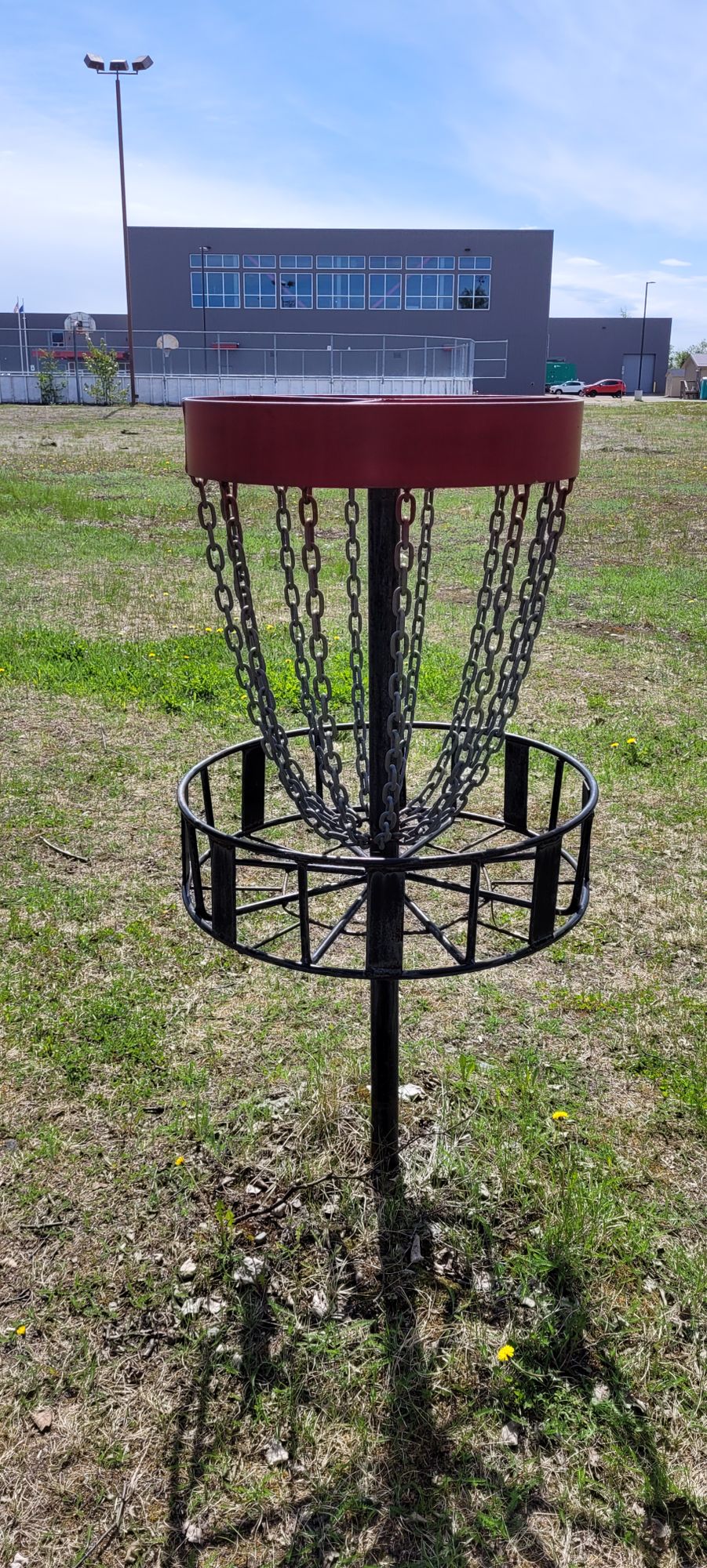 Homemade baskets that catch hyzer putting better than Hanshew's.