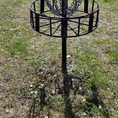 Homemade baskets that catch hyzer putting better than Hanshew's.