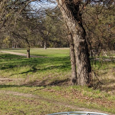 Hole 5's basket looking back at the tee box