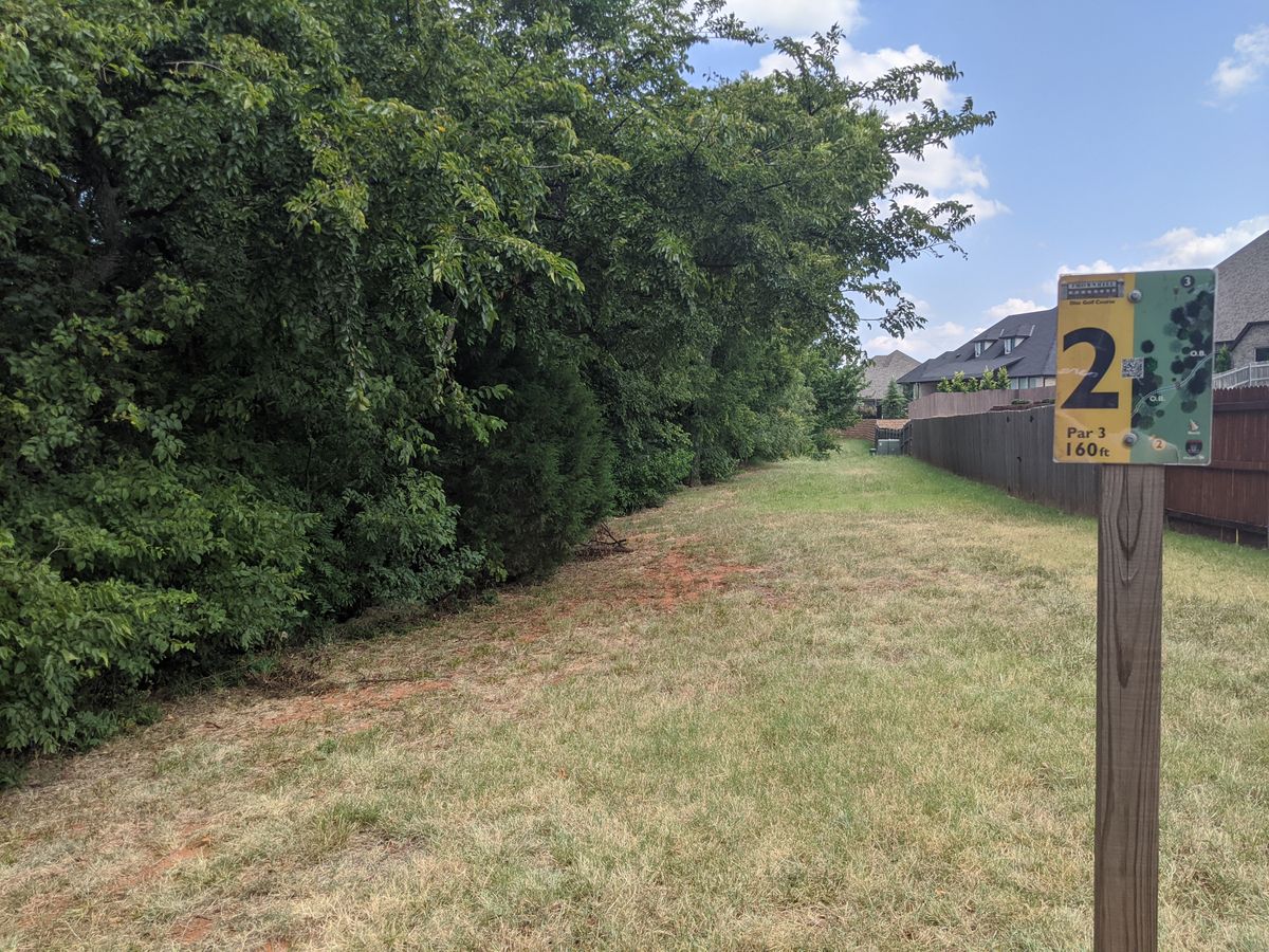 You can't see it from here, but about 100 feet up is an opening to the left that crosses over a creek and through the treeline.