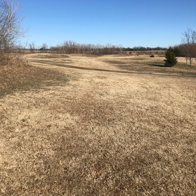 Brush clears. View downhill from hike one tee pad