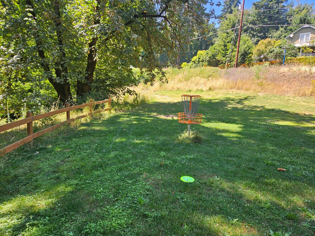 Hole #5 basket and #6 teepad in background