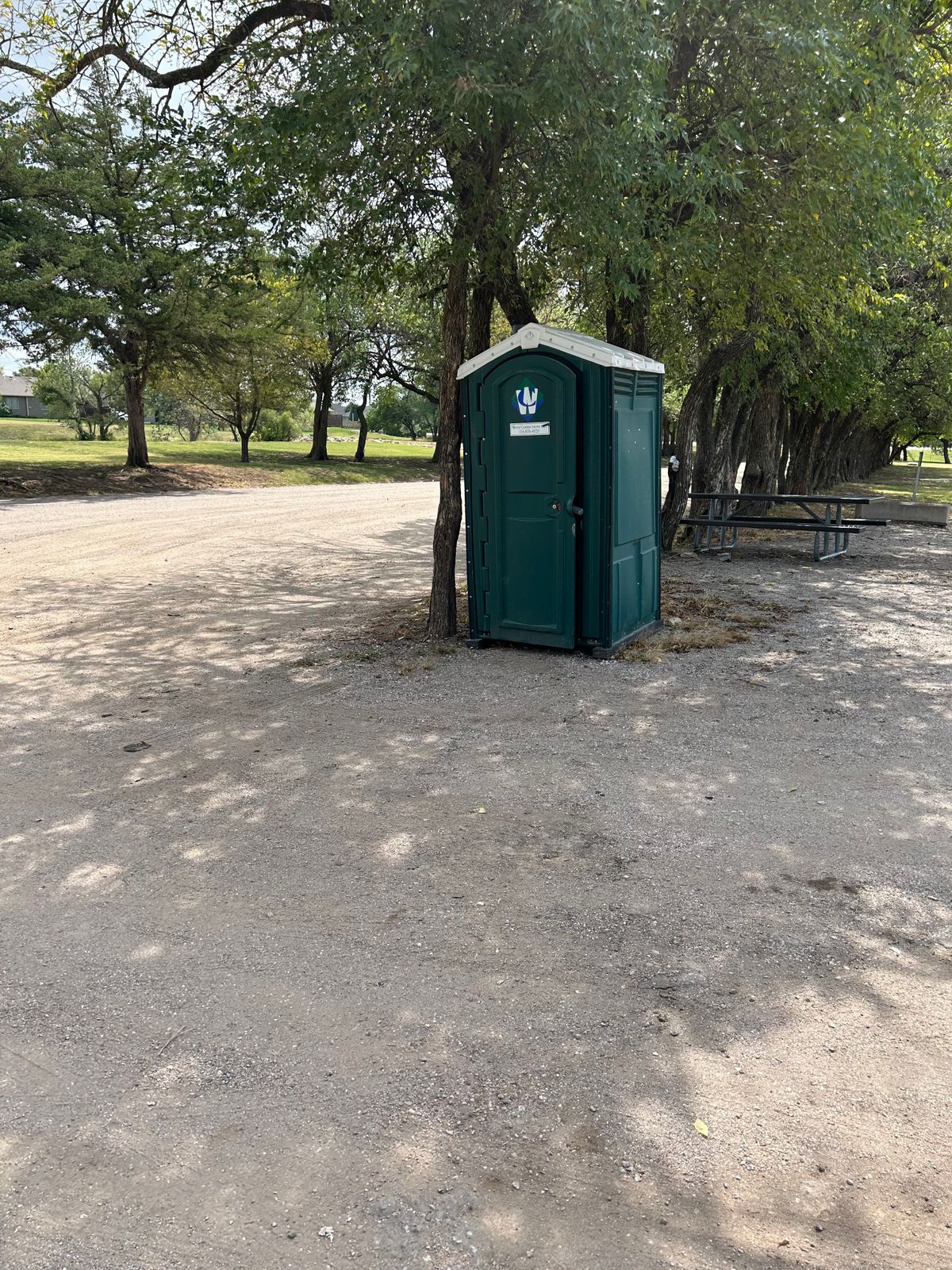 The restroom in the park. Fairly clean for a portable potty