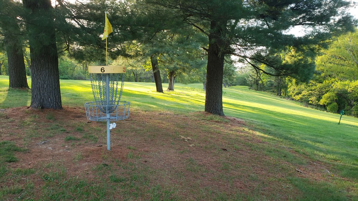 Hole 6 in a picturesque setting .