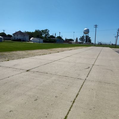 Across parking lot to baseball field for hole 8-9