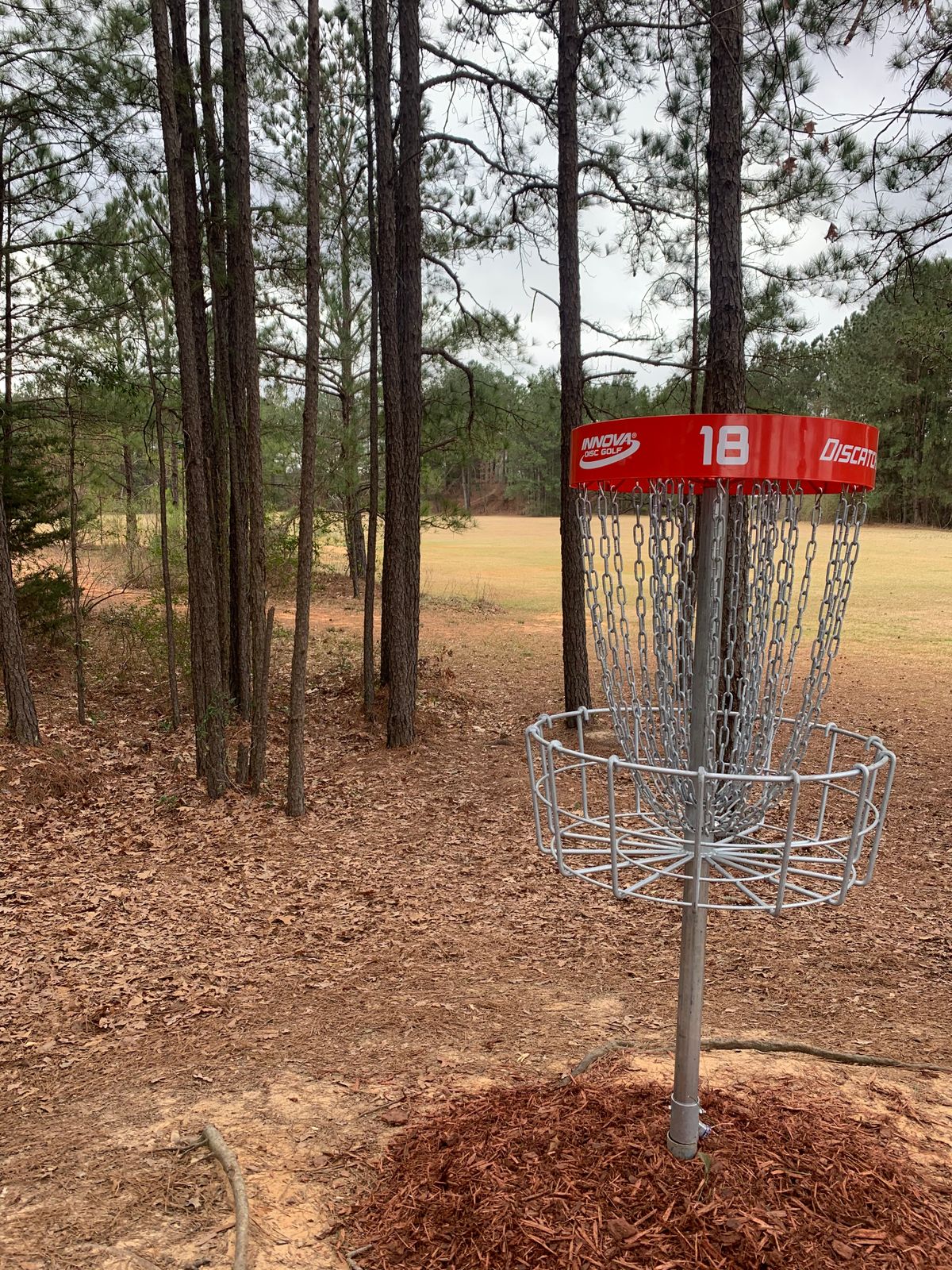 Looking back at 18. Thrown from on top of the hill in the background