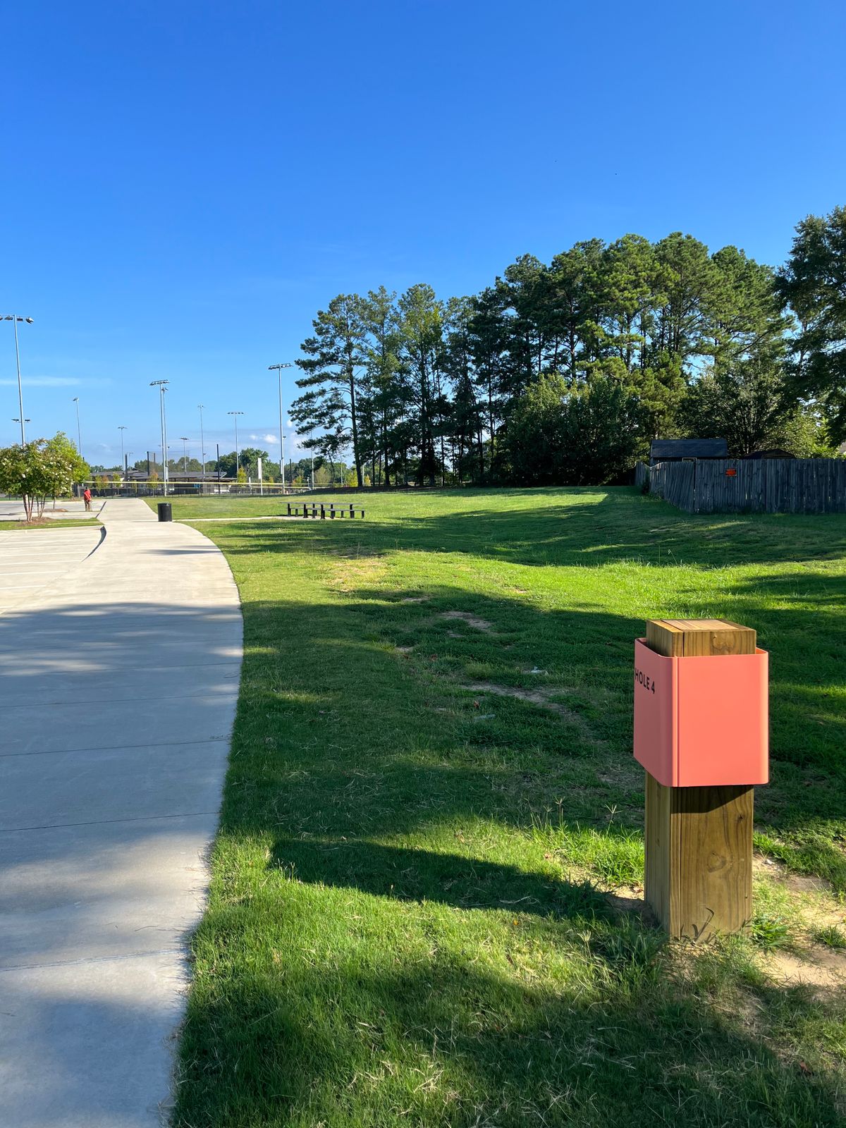 Hole 4: Left Mando at the fence on the right. On or over the sidewalk on left.