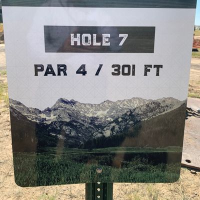 Tee off on dirt/ grass.