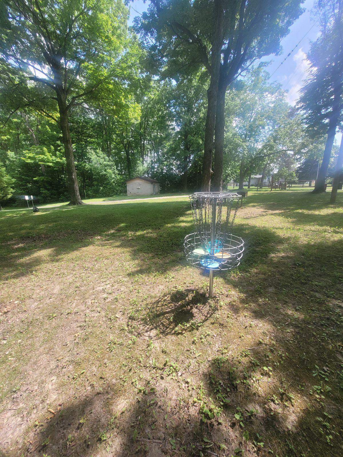 Practice basket near hole 1 tee