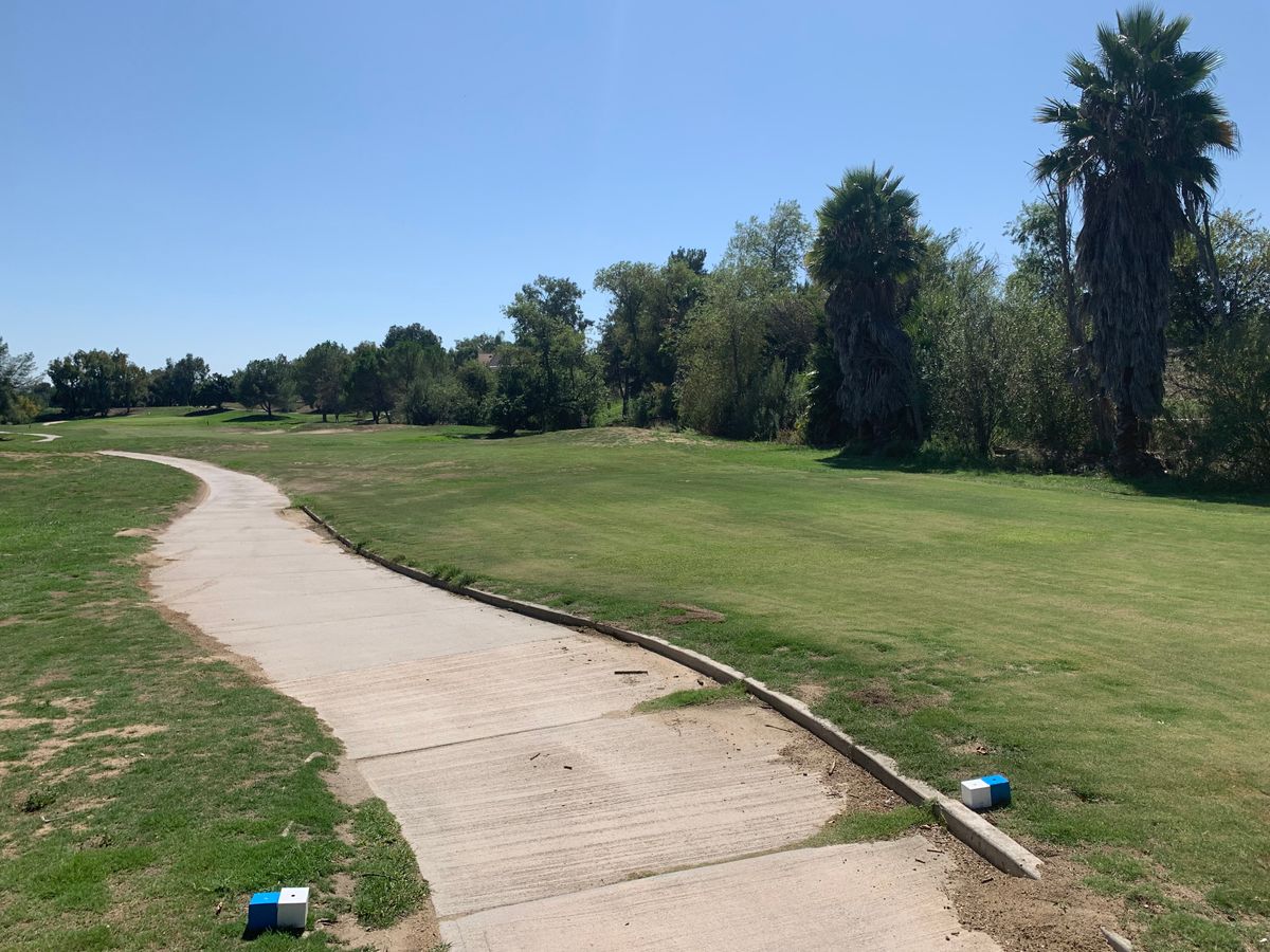 Omega Hole 16 Tee