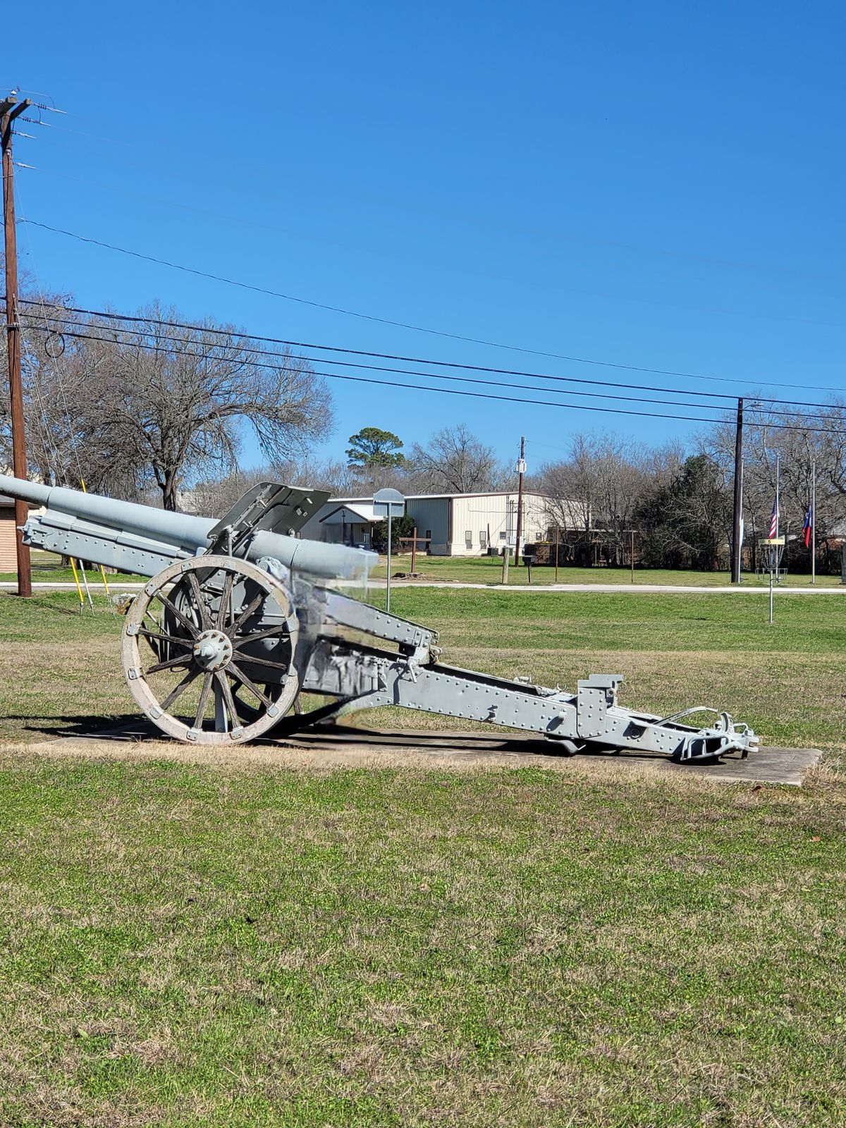 # 5 by a replica of a historical cannon made famous by a flag with a slogan.