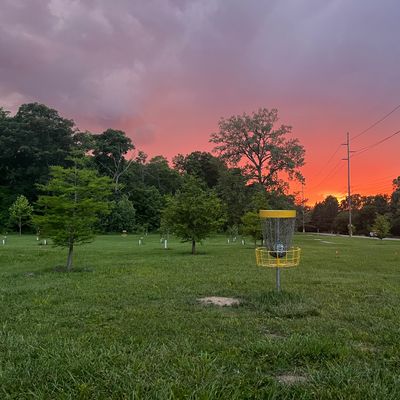 The green of hole 17 with a nice storm and sunset