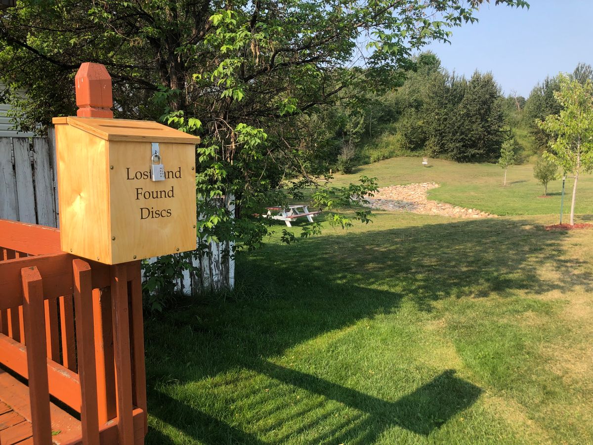 Lost & Found Disc Box located on corner patio of the Snack Shak.