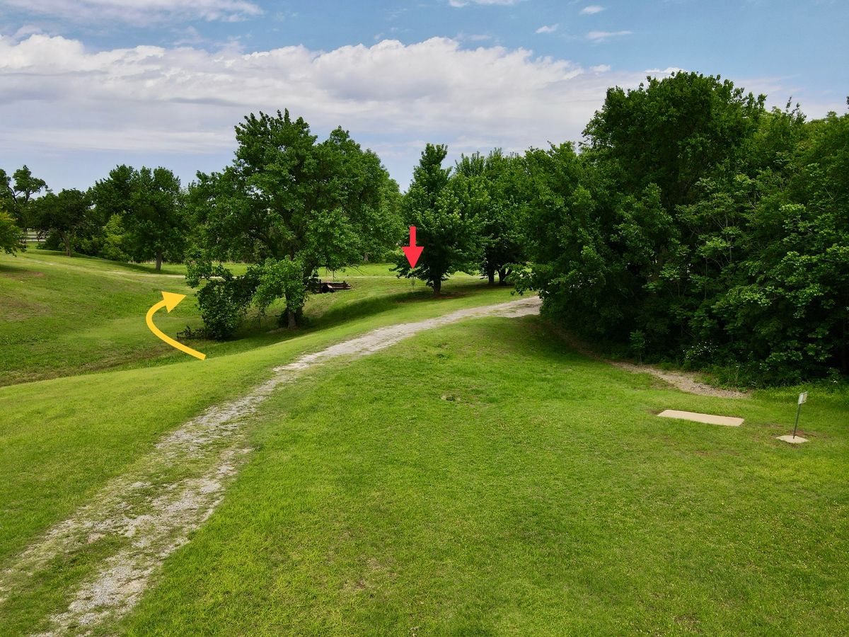 Aerial of hole 8 and mando, ending back under some trees.