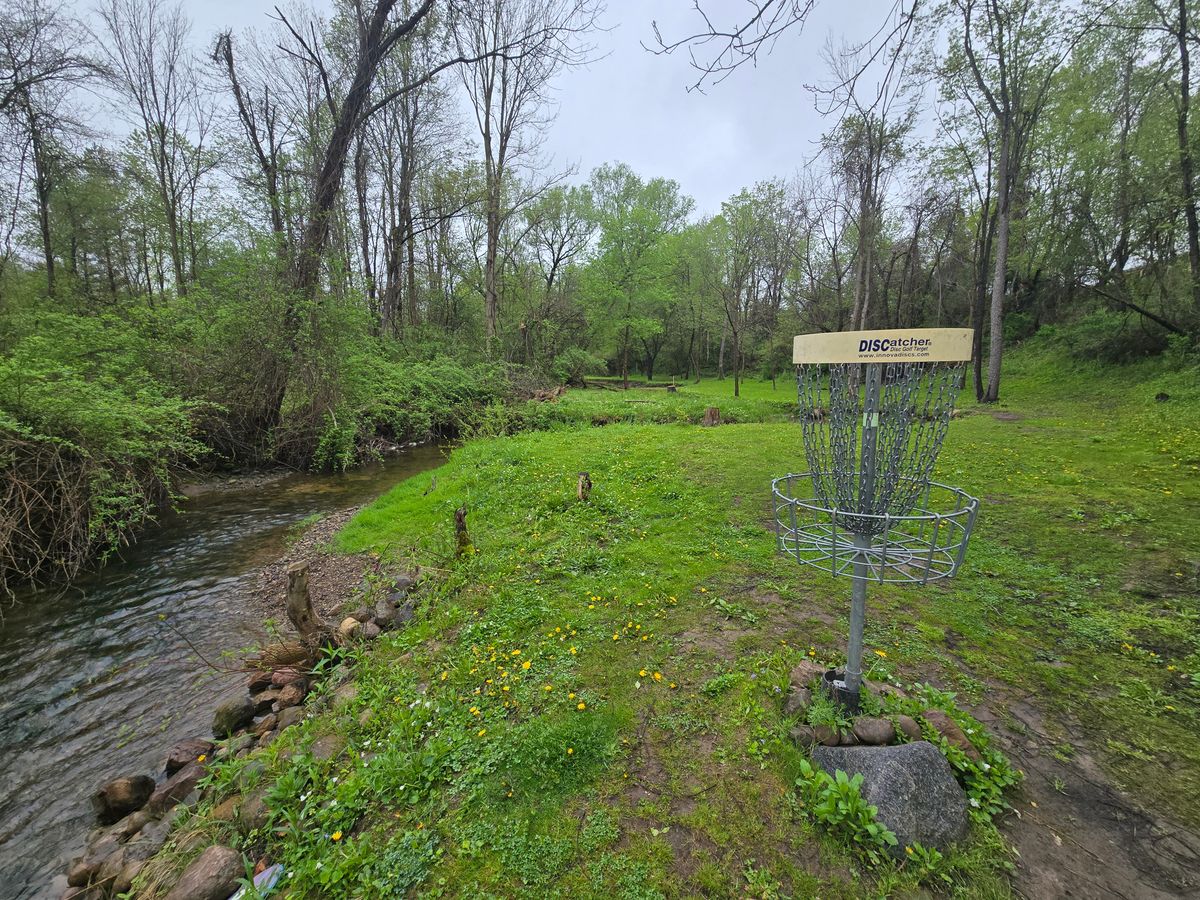 The creeks winds back and forth along hole 4s fairway, then wraps around the green. 10/10 design and execution.
