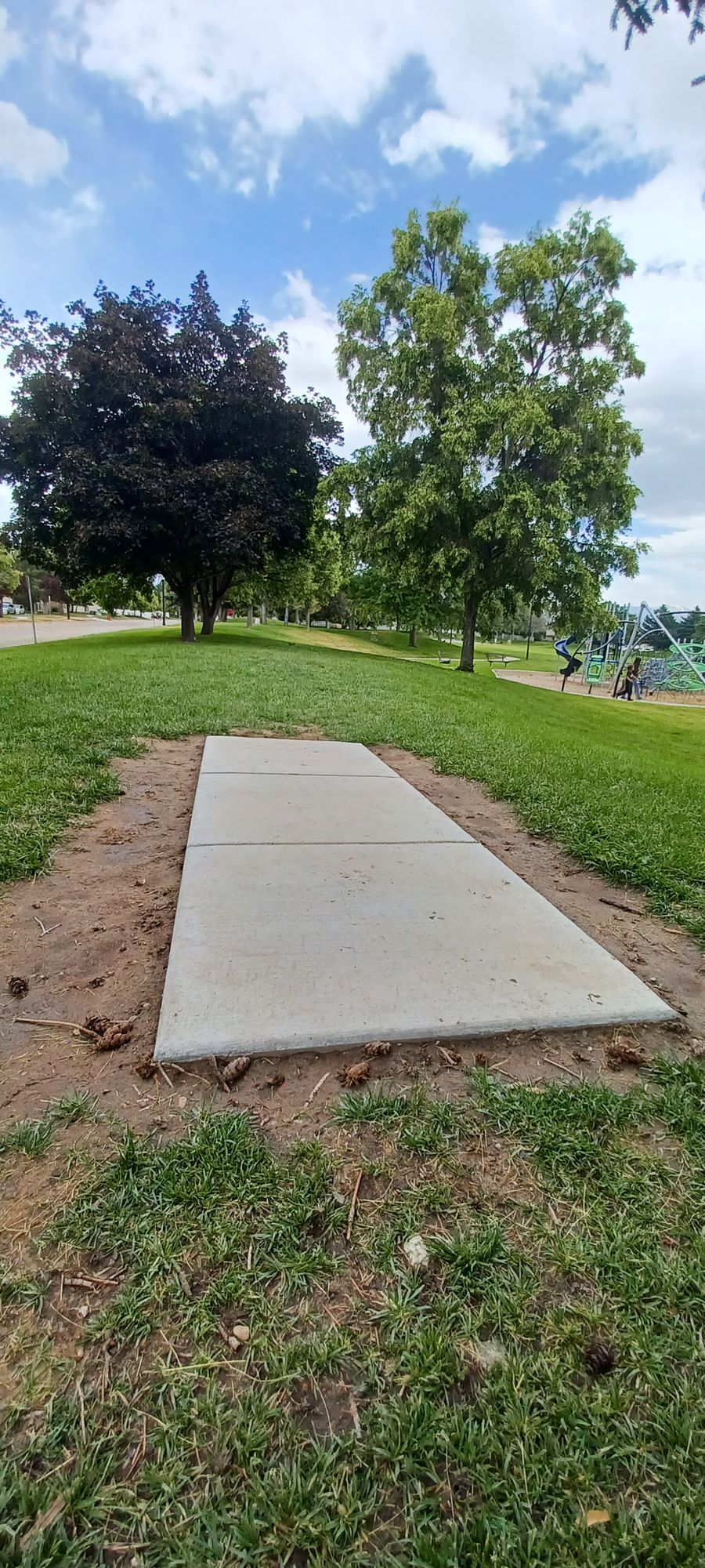 2nd Tee Platform, basket to the right of Platform. Walking path & playground close to area, so please watch out for others.

*This is the 11th hole as well, if you are using the 18 hole scorecard.